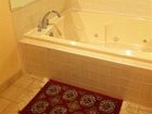 фото отеля Country Hearth Inn Eddyville