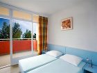 фото отеля Sunset Lanterna Apartments Porec