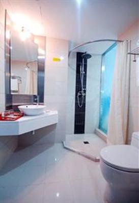 фото отеля Motel 168 Zhangjiagang Jingang Avenue
