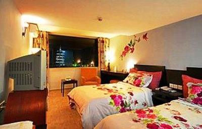 фото отеля Tongde Holiday Hotel