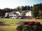 фото отеля Dollinger's Inn & Suites