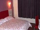 фото отеля Motel 168 Jiashan Jie Fang Xi Road Jiaxing