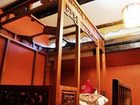 фото отеля Lijiang Wolong Villa