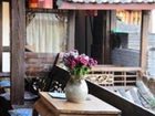 фото отеля Lijiang Wolong Villa