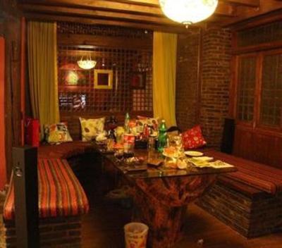 фото отеля Lijiang Sweet Garden Hotel