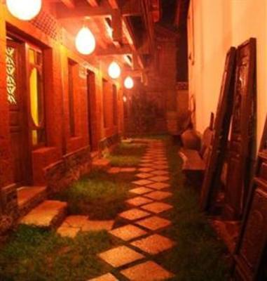 фото отеля Lijiang Sweet Garden Hotel