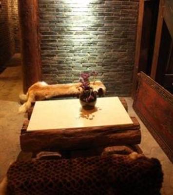 фото отеля Lijiang Sweet Garden Hotel