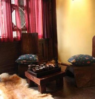 фото отеля Lijiang Sweet Garden Hotel