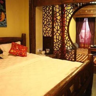 фото отеля Lijiang Sweet Garden Hotel