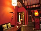 фото отеля Lijiang Sweet Garden Hotel
