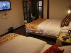 фото отеля Lijiang Sweet Garden Hotel