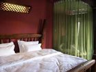 фото отеля Lijiang Sweet Garden Hotel