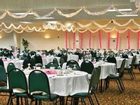 фото отеля Belmont Inn & Suites