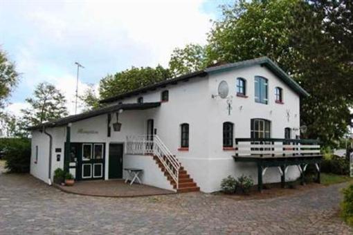 фото отеля Der Muhlenhof Hotel Busum