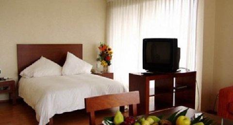 фото отеля San Marino Suites Hotel