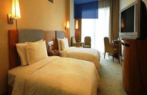 фото отеля Xinshikong Conifer Hotel
