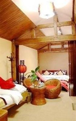 фото отеля Lazy Sun Inn Lijiang
