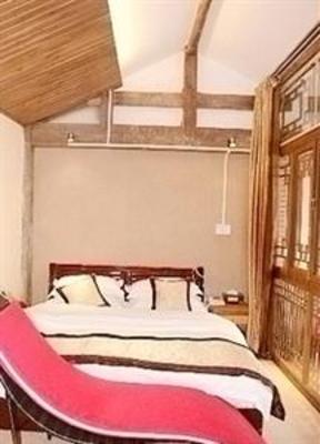 фото отеля Lazy Sun Inn Lijiang