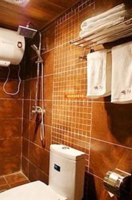 фото отеля Lazy Sun Inn Lijiang