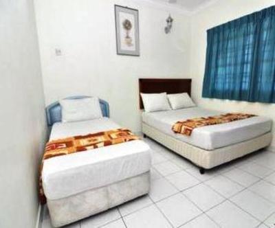 фото отеля Kota Lodge Townhouse