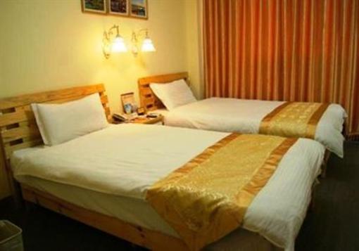 фото отеля Xishuangbanna Bodhi Island Business Hotel