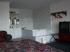фото отеля Country Hearth Inn Horse Cave