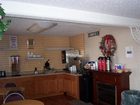 фото отеля Country Hearth Inn Horse Cave