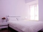 фото отеля Holiday Time Apartment Hotel Guanyin Bridge