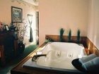 фото отеля Antiques and Lace Inn
