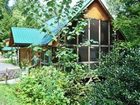 фото отеля Mountain Shadows Log Home Resort