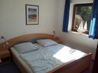 фото отеля Ostseehaus Petersen Apartment Gromitz