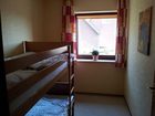 фото отеля Ostseehaus Petersen Apartment Gromitz