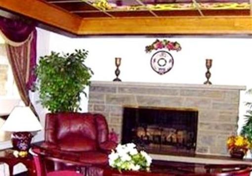 фото отеля Red Carpet Inn Henrietta