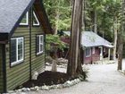 фото отеля Surfs Inn Rainforest Cottages