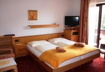 фото отеля Pension & Ferienwohnungen Goldene Rose Villach