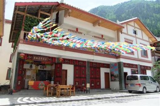 фото отеля Zhuoma Youth Hostel