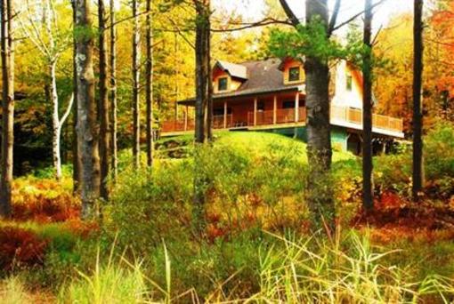 фото отеля Sterling Ridge Inn & Log Cabins