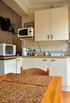 фото отеля Dempsey's Guest House