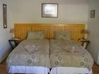 фото отеля Dempsey's Guest House