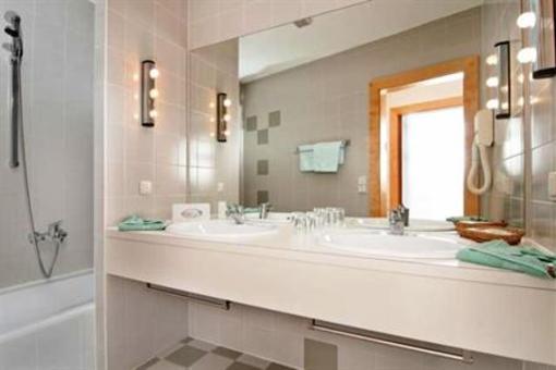 фото отеля Erlebnis Hotel Appartements Latschach