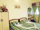 фото отеля Kamat Holiday Homes