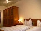 фото отеля FeWo GardenView Apartments Nüdlingen