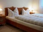 фото отеля FeWo GardenView Apartments Nüdlingen