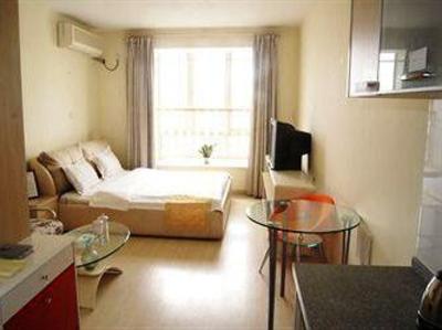 фото отеля Nanjing Kaibin Apartment Chengkai YueShi Dian