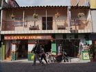 фото отеля Tomate Café Hostel