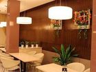 фото отеля Jin Jiang Inn Chengzhong Road Shanghai