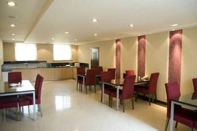 фото отеля Jinyang Business Hotel Dashiqiao Heping Main Street