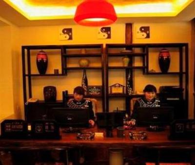фото отеля Taiji Yangsheng Xiangheyuan Inn