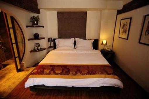фото отеля Taiji Yangsheng Xiangheyuan Inn