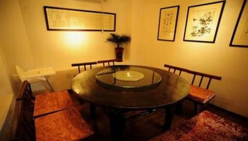 фото отеля Taiji Yangsheng Xiangheyuan Inn